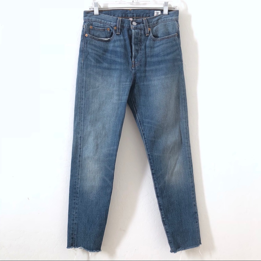 Raw hemmed white oak cone denim Levi jeans
